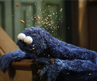 Cookie Monster eats Sesame Street